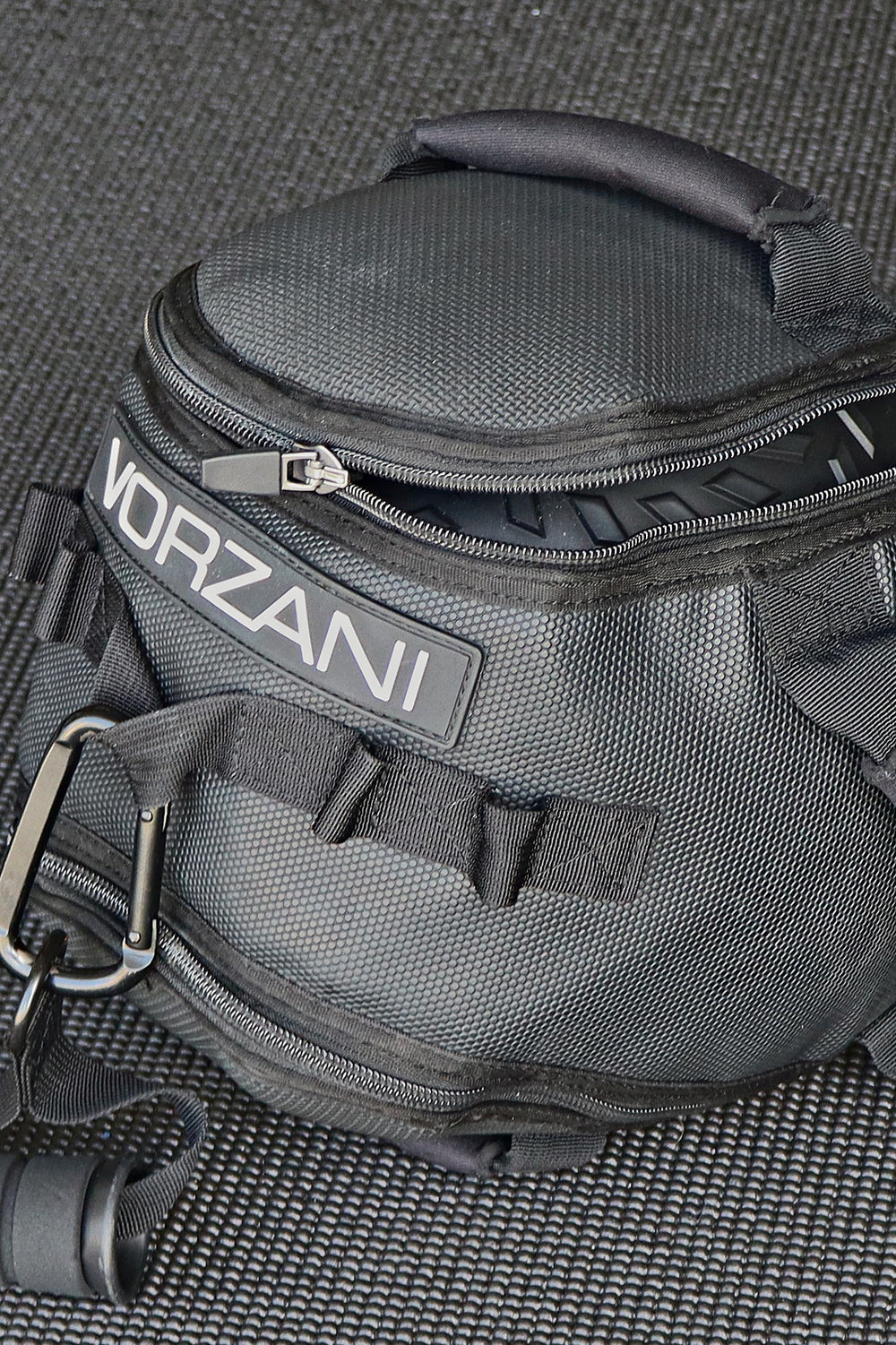 VORZANI Fit Sphere (10-inch) covering, quarter-unzipped showing the weighted ball tread inside